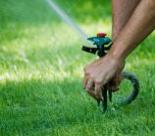 adjusting a sprinkler head for proper irrigation